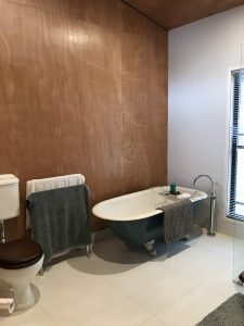 Hardwood bathroom feature wall