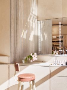 Warm and earthy aesthetic achieved in a retail space using plywood